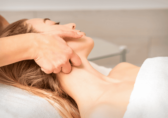 A woman getting a lymphatic drainage massage